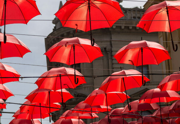 Many red umbrellas hanging in the city street Belgrade, Serbia